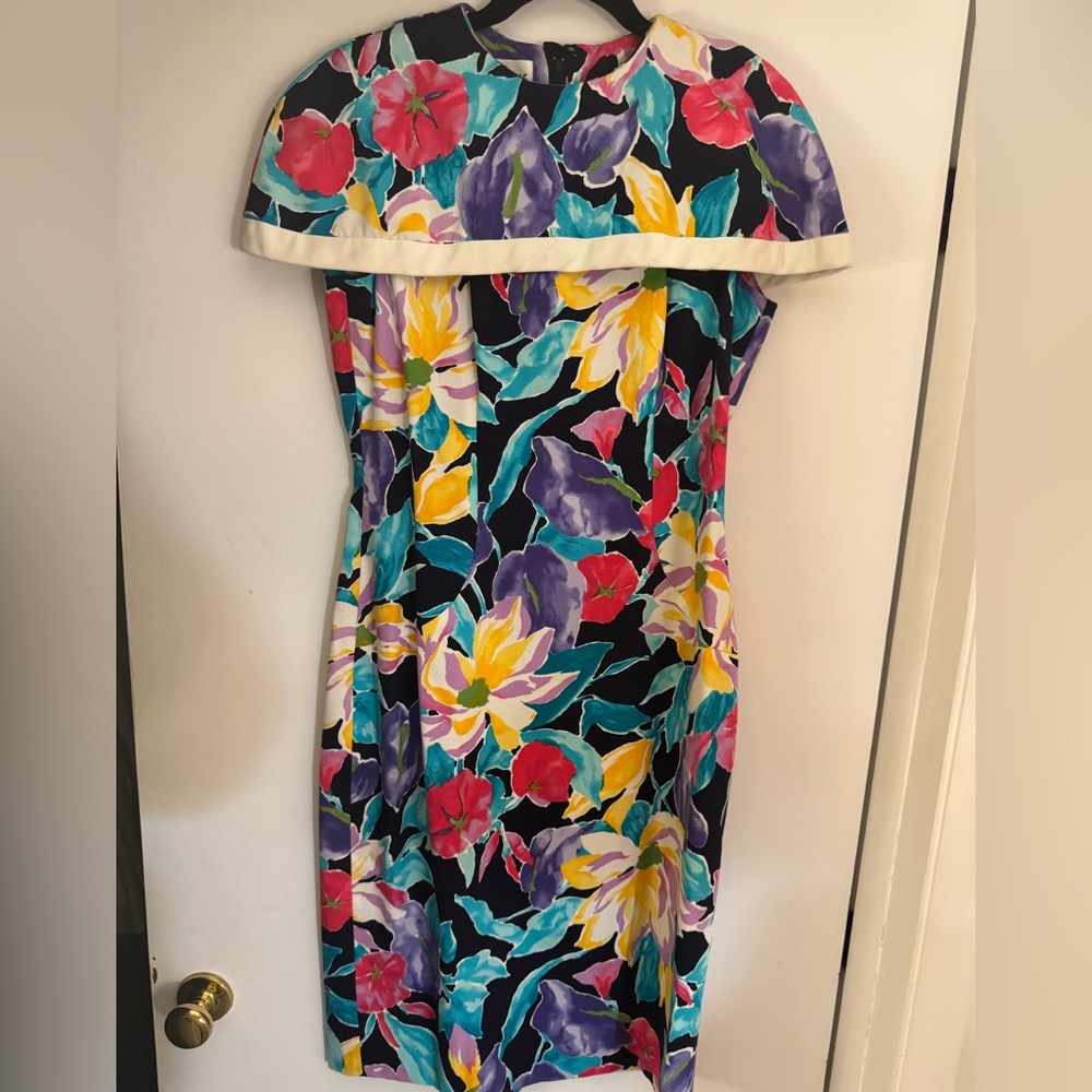 Custom tailored to remove shoulder pads and bring this dress into the new era